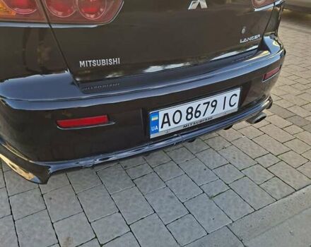 Мицубиси Лансер 2007 в Ужгороде на Automoto.ua Черный Мицубиси Лансер, объемом двигателя 2 л и пробегом 256 тыс. км за 7200 $, фото 4 на Automoto.ua