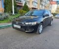 Чорний Міцубісі Lancer, об'ємом двигуна 1.5 л та пробігом 242 тис. км за 5550 $, фото 1 на Automoto.ua