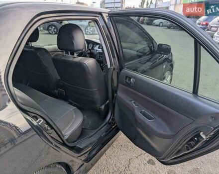 Чорний Міцубісі Lancer, об'ємом двигуна 2 л та пробігом 152 тис. км за 5500 $, фото 12 на Automoto.ua
