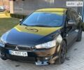 Чорний Міцубісі Lancer, об'ємом двигуна 2 л та пробігом 215 тис. км за 6400 $, фото 1 на Automoto.ua