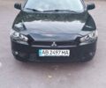 Черный Мицубиси Лансер, объемом двигателя 2 л и пробегом 210 тыс. км за 6000 $, фото 1 на Automoto.ua