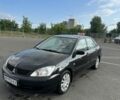Чорний Міцубісі Lancer, об'ємом двигуна 1.6 л та пробігом 299 тис. км за 3850 $, фото 1 на Automoto.ua