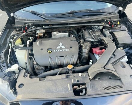 Черный Мицубиси Лансер, объемом двигателя 2 л и пробегом 170 тыс. км за 7900 $, фото 10 на Automoto.ua