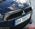Чорний Міцубісі Lancer, об'ємом двигуна 2 л та пробігом 205 тис. км за 6500 $, фото 1 на Automoto.ua
