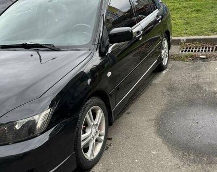 Черный Мицубиси Лансер, объемом двигателя 2 л и пробегом 219 тыс. км за 4400 $, фото 10 на Automoto.ua