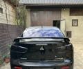 Чорний Міцубісі Lancer, об'ємом двигуна 2 л та пробігом 175 тис. км за 6500 $, фото 3 на Automoto.ua