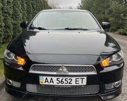 Чорний Міцубісі Lancer, об'ємом двигуна 2 л та пробігом 69 тис. км за 6200 $, фото 1 на Automoto.ua