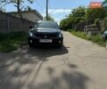 Черный Мицубиси Лансер, объемом двигателя 2 л и пробегом 190 тыс. км за 3450 $, фото 1 на Automoto.ua