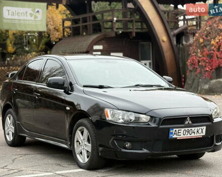 Чорний Міцубісі Lancer, об'ємом двигуна 2 л та пробігом 224 тис. км за 6500 $, фото 1 на Automoto.ua
