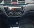 Чорний Міцубісі Lancer, об'ємом двигуна 1.6 л та пробігом 273 тис. км за 3999 $, фото 31 на Automoto.ua
