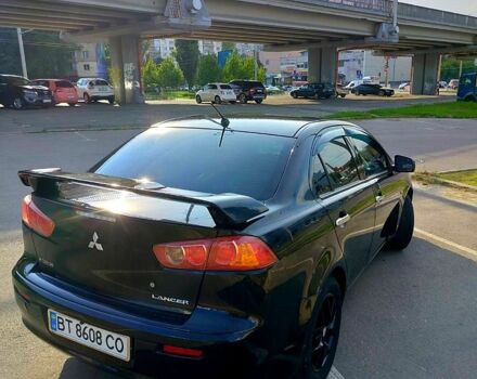 Черный Мицубиси Лансер, объемом двигателя 1.5 л и пробегом 215 тыс. км за 5600 $, фото 2 на Automoto.ua