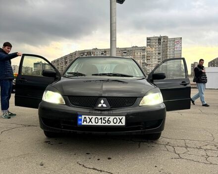 Чорний Міцубісі Lancer, об'ємом двигуна 1.6 л та пробігом 220 тис. км за 4200 $, фото 2 на Automoto.ua