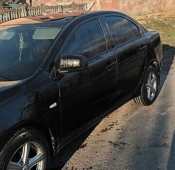 Черный Мицубиси Лансер, объемом двигателя 1.5 л и пробегом 270 тыс. км за 4999 $, фото 6 на Automoto.ua