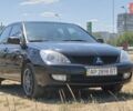 Черный Мицубиси Лансер, объемом двигателя 1.58 л и пробегом 219 тыс. км за 5800 $, фото 8 на Automoto.ua