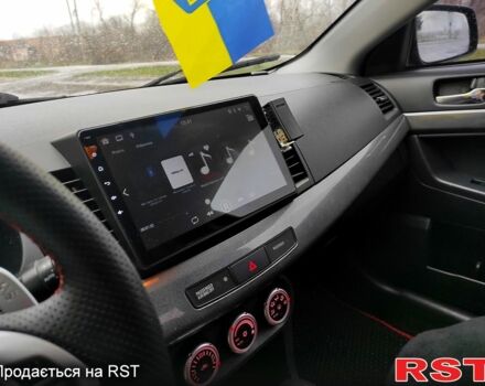 Чорний Міцубісі Lancer, об'ємом двигуна 2 л та пробігом 156 тис. км за 7400 $, фото 2 на Automoto.ua