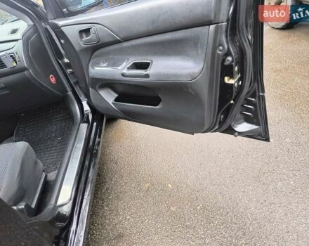 Черный Мицубиси Лансер, объемом двигателя 1.6 л и пробегом 309 тыс. км за 4000 $, фото 15 на Automoto.ua