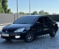 Чорний Міцубісі Lancer, об'ємом двигуна 1.6 л та пробігом 191 тис. км за 4899 $, фото 1 на Automoto.ua