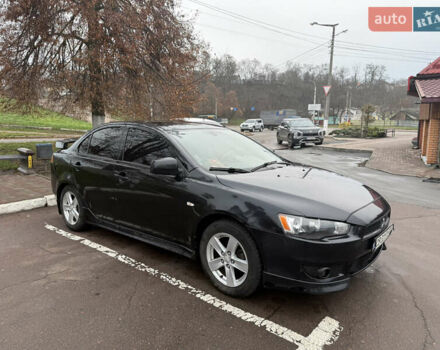 Чорний Міцубісі Lancer, об'ємом двигуна 2 л та пробігом 281 тис. км за 6000 $, фото 5 на Automoto.ua