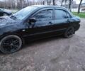 Чорний Міцубісі Lancer, об'ємом двигуна 1.6 л та пробігом 259 тис. км за 4500 $, фото 5 на Automoto.ua
