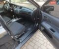 Черный Мицубиси Лансер, объемом двигателя 1.6 л и пробегом 275 тыс. км за 3999 $, фото 9 на Automoto.ua