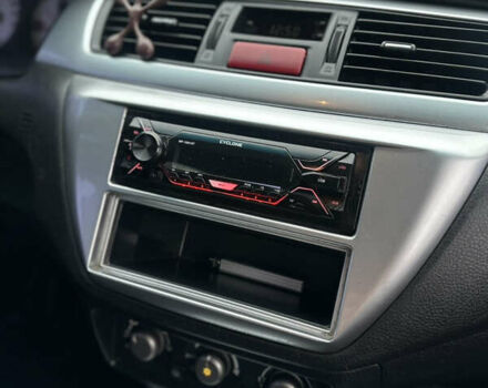 Черный Мицубиси Лансер, объемом двигателя 2 л и пробегом 260 тыс. км за 5300 $, фото 16 на Automoto.ua