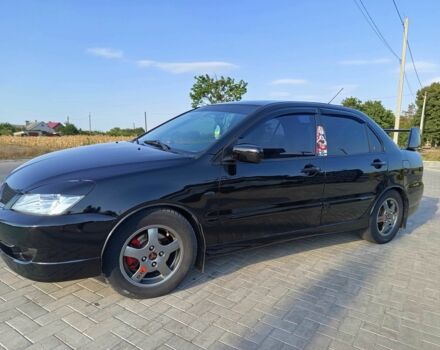 Чорний Міцубісі Lancer, об'ємом двигуна 1.6 л та пробігом 3 тис. км за 4500 $, фото 3 на Automoto.ua