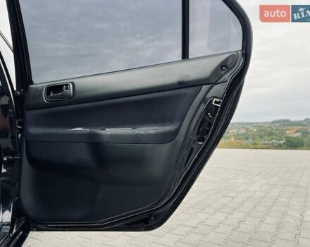 Чорний Міцубісі Lancer, об'ємом двигуна 1.6 л та пробігом 243 тис. км за 4950 $, фото 43 на Automoto.ua