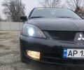 Чорний Міцубісі Lancer, об'ємом двигуна 1.6 л та пробігом 210 тис. км за 4550 $, фото 1 на Automoto.ua