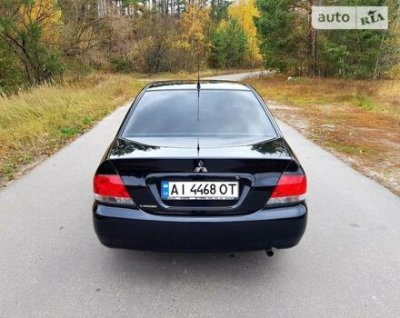 Чорний Міцубісі Lancer, об'ємом двигуна 1.6 л та пробігом 240 тис. км за 4950 $, фото 7 на Automoto.ua