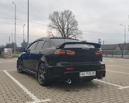 Черный Мицубиси Лансер, объемом двигателя 2 л и пробегом 160 тыс. км за 8000 $, фото 2 на Automoto.ua