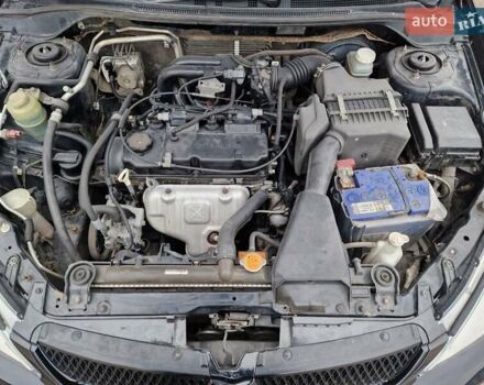 Чорний Міцубісі Lancer, об'ємом двигуна 1.6 л та пробігом 273 тис. км за 3999 $, фото 23 на Automoto.ua