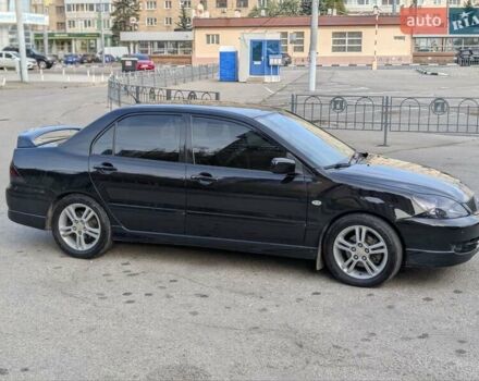 Чорний Міцубісі Lancer, об'ємом двигуна 2 л та пробігом 152 тис. км за 5500 $, фото 4 на Automoto.ua