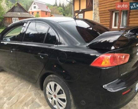 Черный Мицубиси Лансер, объемом двигателя 1.5 л и пробегом 240 тыс. км за 6900 $, фото 12 на Automoto.ua