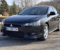 Чорний Міцубісі Lancer, об'ємом двигуна 2 л та пробігом 189 тис. км за 6800 $, фото 1 на Automoto.ua