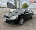 Чорний Міцубісі Lancer, об'ємом двигуна 1.6 л та пробігом 168 тис. км за 3800 $, фото 1 на Automoto.ua