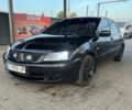 Черный Мицубиси Лансер, объемом двигателя 1.6 л и пробегом 420 тыс. км за 3518 $, фото 1 на Automoto.ua