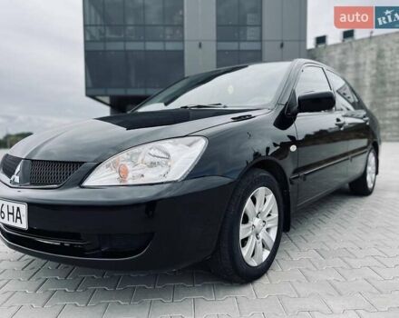 Чорний Міцубісі Lancer, об'ємом двигуна 1.6 л та пробігом 243 тис. км за 4950 $, фото 6 на Automoto.ua