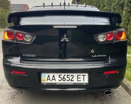 Чорний Міцубісі Lancer, об'ємом двигуна 2 л та пробігом 69 тис. км за 6200 $, фото 10 на Automoto.ua