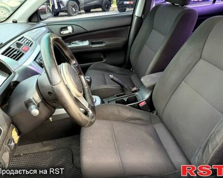 Черный Мицубиси Лансер, объемом двигателя 1.6 л и пробегом 260 тыс. км за 3700 $, фото 5 на Automoto.ua