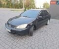 Черный Мицубиси Лансер, объемом двигателя 2 л и пробегом 300 тыс. км за 3200 $, фото 12 на Automoto.ua