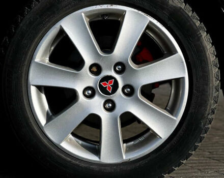 Черный Мицубиси Лансер, объемом двигателя 2 л и пробегом 333 тыс. км за 7300 $, фото 10 на Automoto.ua