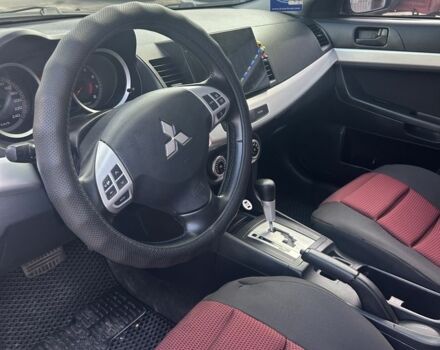 Мицубиси Лансер 2007 в Запорожье на Automoto.ua Черный Мицубиси Лансер, объемом двигателя 2 л и пробегом 208 тыс. км за 6800 $, фото 7 на Automoto.ua