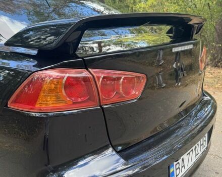 Черный Мицубиси Лансер, объемом двигателя 2 л и пробегом 280 тыс. км за 6800 $, фото 1 на Automoto.ua