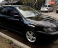 Черный Мицубиси Лансер, объемом двигателя 2 л и пробегом 145 тыс. км за 4300 $, фото 1 на Automoto.ua