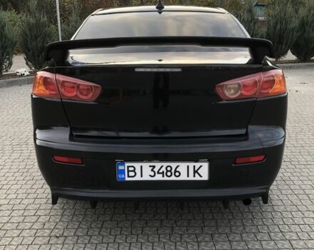 Чорний Міцубісі Lancer, об'ємом двигуна 2 л та пробігом 194 тис. км за 5950 $, фото 3 на Automoto.ua