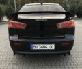 Чорний Міцубісі Lancer, об'ємом двигуна 2 л та пробігом 194 тис. км за 5950 $, фото 3 на Automoto.ua