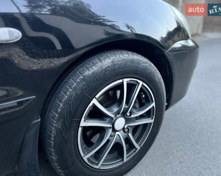 Черный Мицубиси Лансер, объемом двигателя 1.58 л и пробегом 278 тыс. км за 4800 $, фото 14 на Automoto.ua