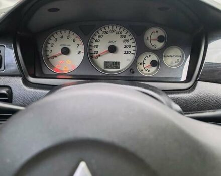 Черный Мицубиси Лансер, объемом двигателя 1.6 л и пробегом 309 тыс. км за 4000 $, фото 20 на Automoto.ua
