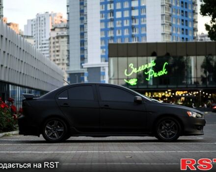 Чорний Міцубісі Lancer, об'ємом двигуна 2 л та пробігом 204 тис. км за 7000 $, фото 6 на Automoto.ua