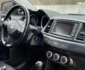 Черный Мицубиси Лансер, объемом двигателя 2 л и пробегом 317 тыс. км за 6990 $, фото 26 на Automoto.ua